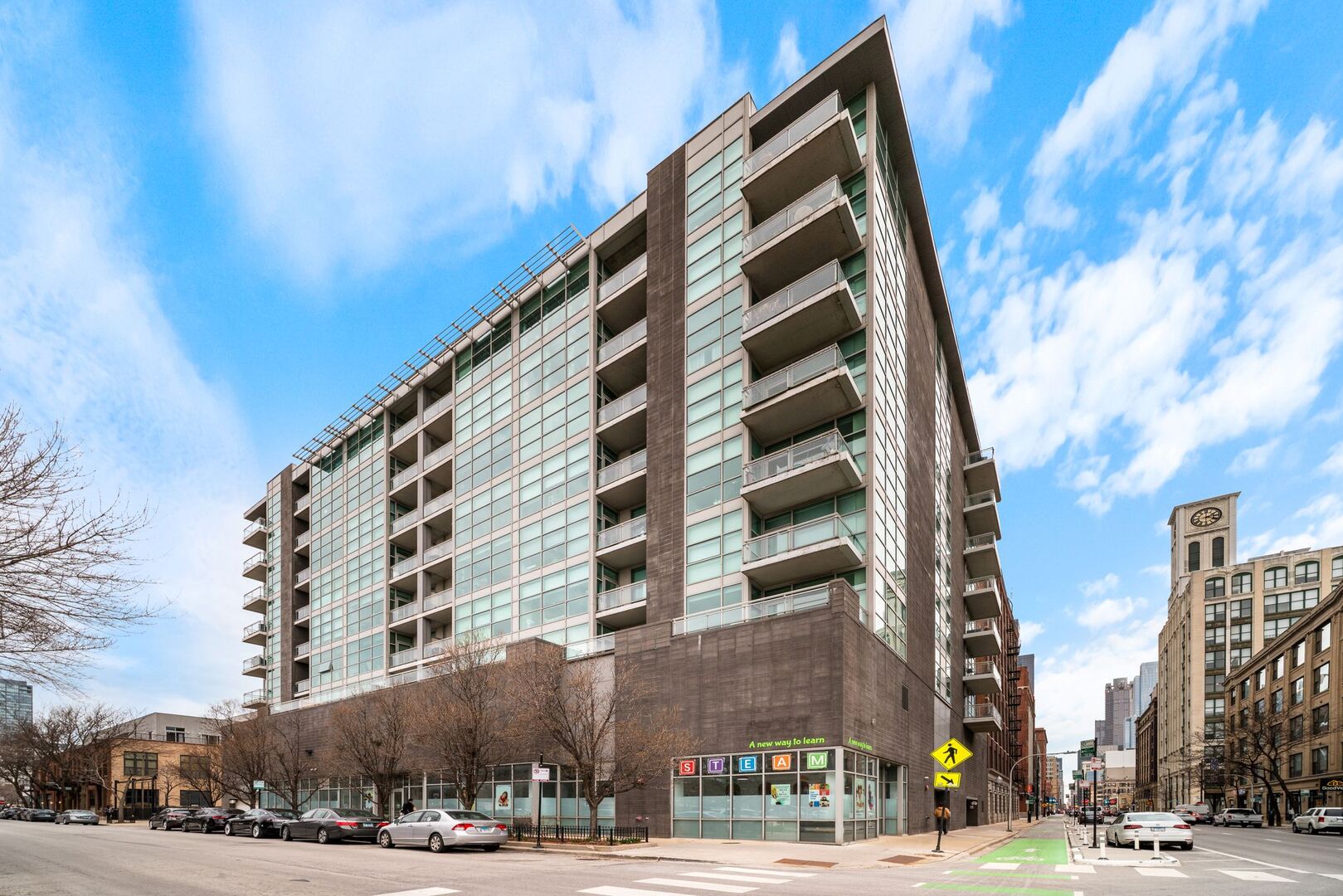 225 South Sangamon Street, Unit 308 Chicago, IL 60607 - Photo 1 of 34 a view of a tall building next to a road