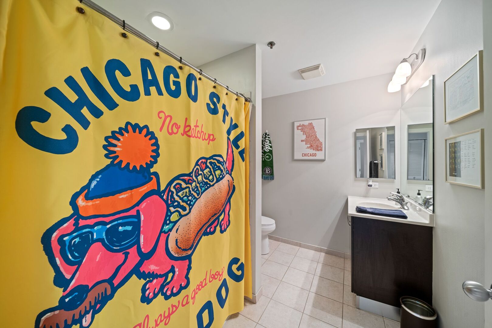 225 South Sangamon Street, Unit 308 Chicago, IL 60607 - Photo 20 of 34 a bathroom with a sink mirror and vanity
