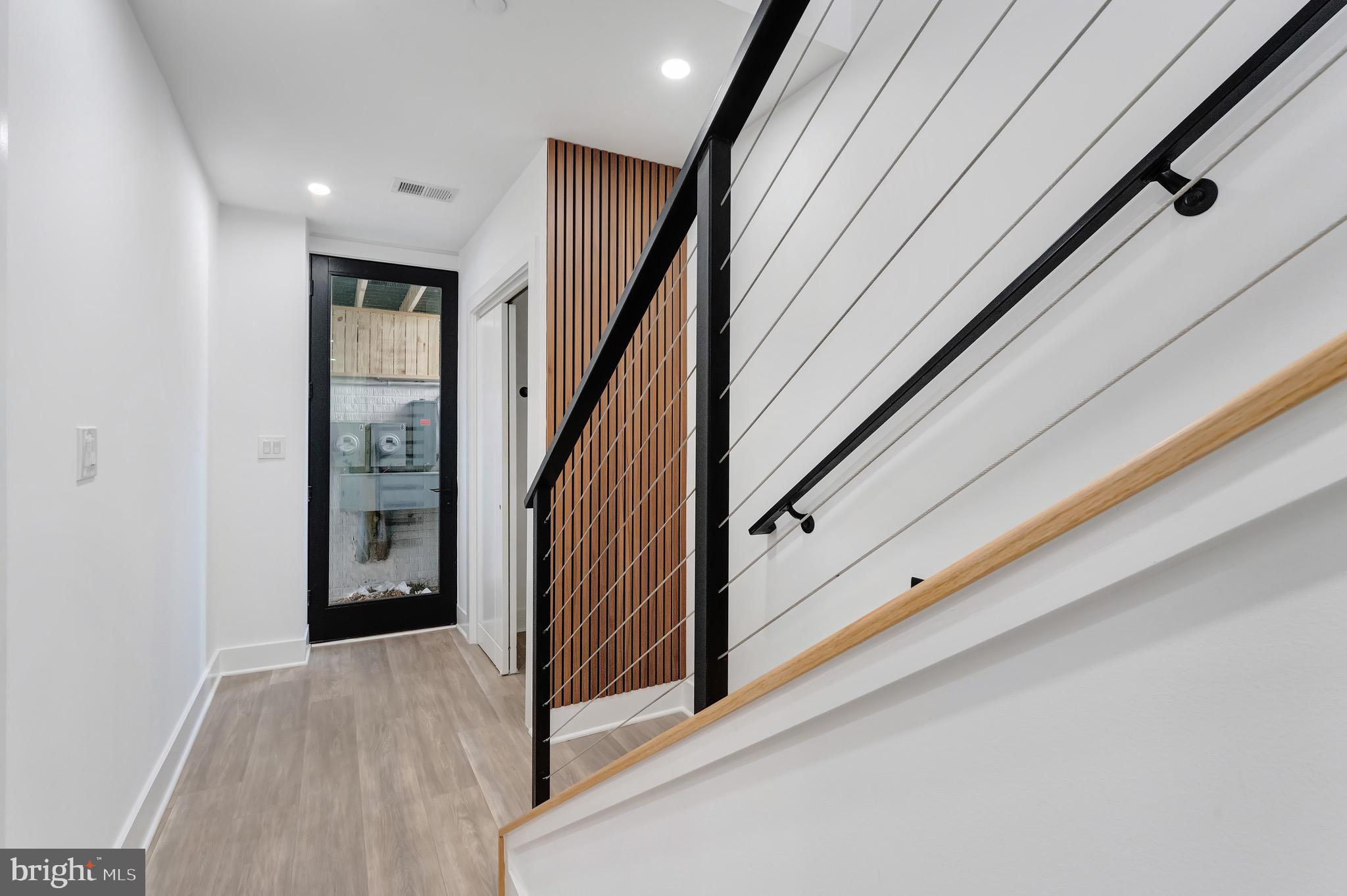 3009 13th Street Northwest, Unit 1 Washington, DC 20009 - Photo 20 of 42 a view of a hallway with staircase