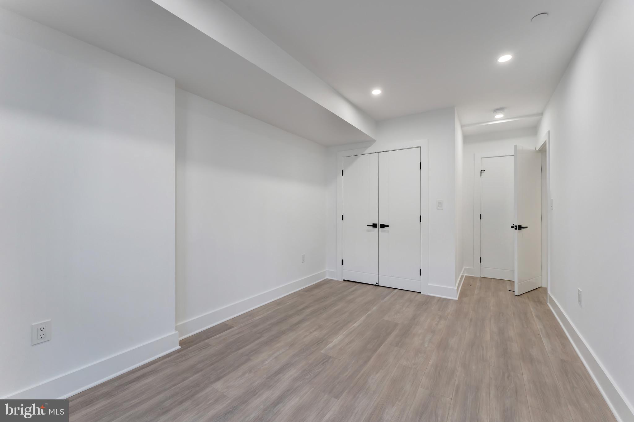 3009 13th Street Northwest, Unit 1 Washington, DC 20009 - Photo 29 of 42 a view of room with wooden floor
