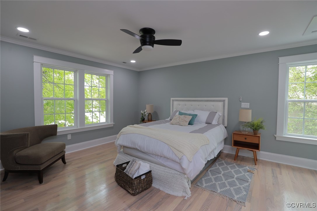 901 Rosegill Road Chesterfield, VA 23236 - Photo 20 of 30 a bedroom with a bed and glass window