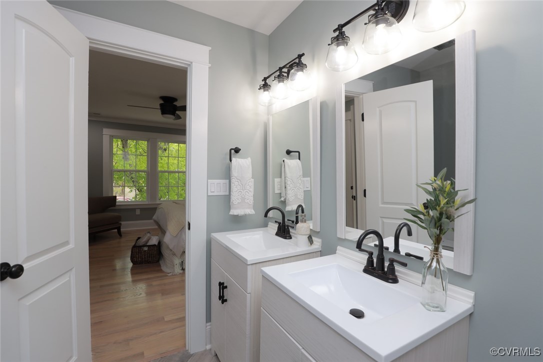 901 Rosegill Road Chesterfield, VA 23236 - Photo 22 of 30 a en suite bathroom with a sink and mirror