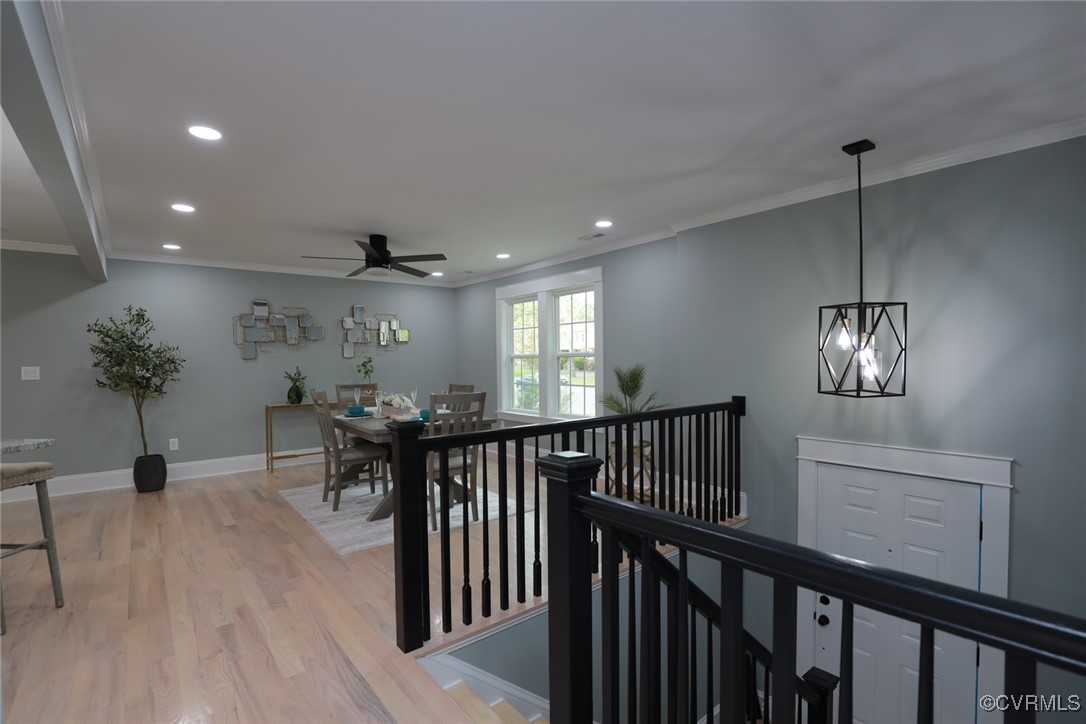 901 Rosegill Road Chesterfield, VA 23236 - Photo 27 of 30 a view of a livingroom with furniture wooden floor a chandelier