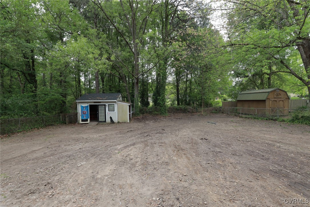 901 Rosegill Road Chesterfield, VA 23236 - Photo 29 of 30 a view of a house with a yard and large trees