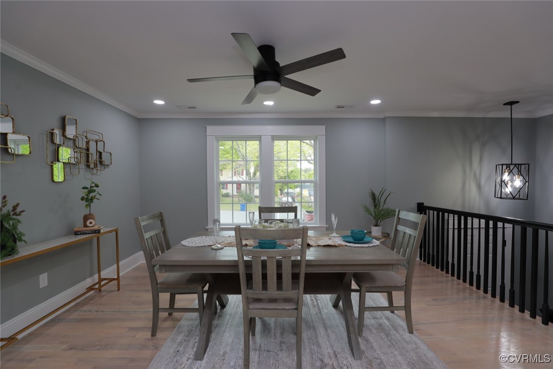 901 Rosegill Road Chesterfield, VA 23236 - Photo 5 of 30 a view of a dining room with furniture window and wooden floor