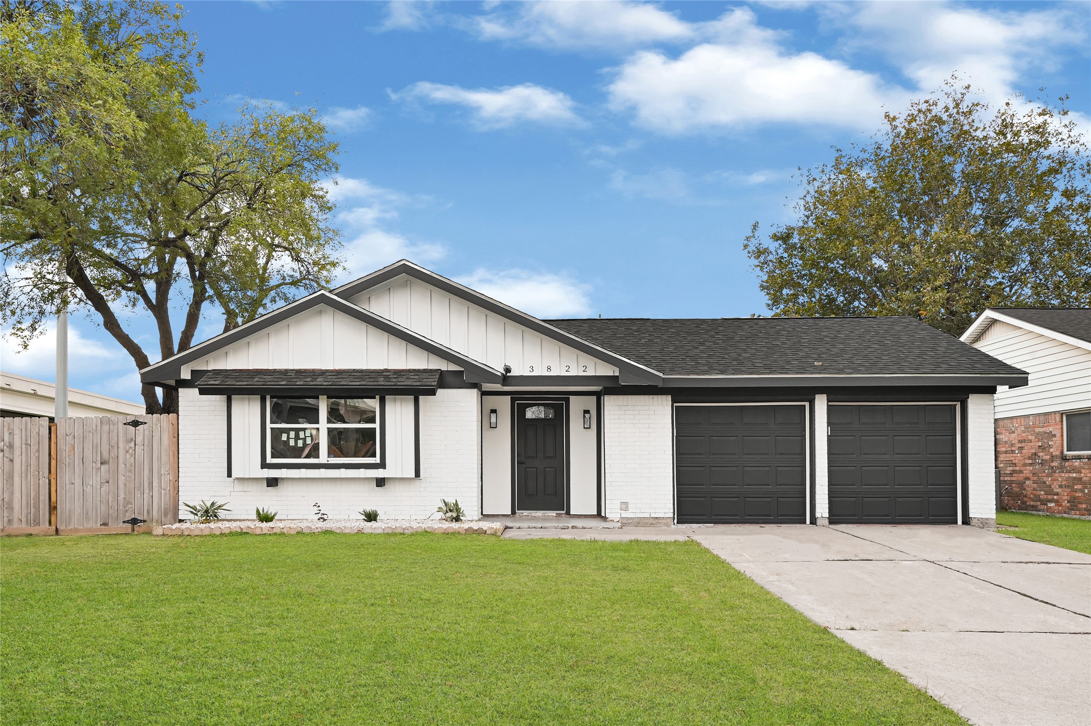 front view of a house with a yard