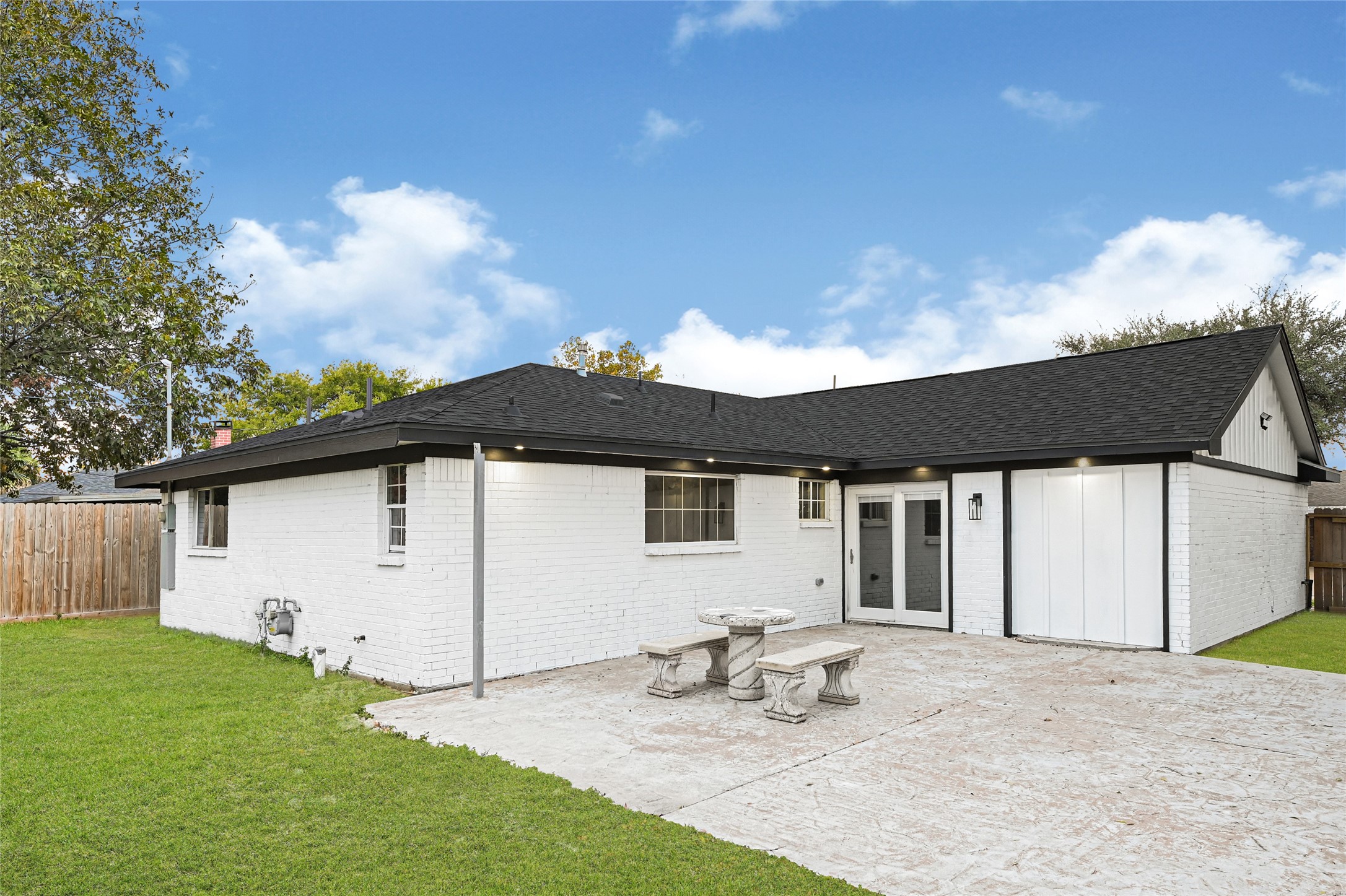 3822 Darling Avenue Pasadena, TX 77503 - Photo 14 of 19 a backyard of a house with table and chairs