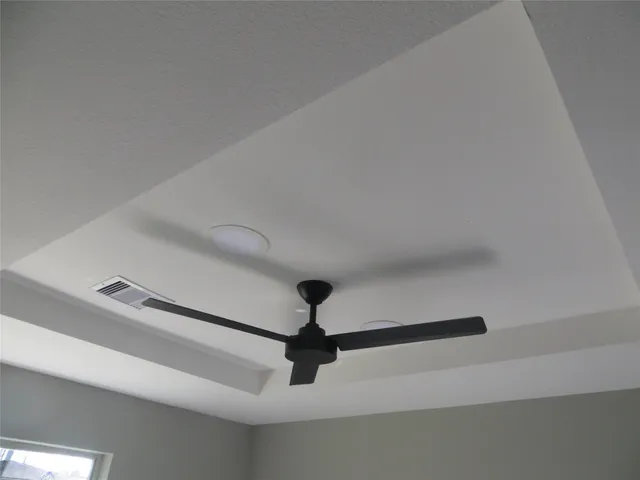 a room with ceiling fan
