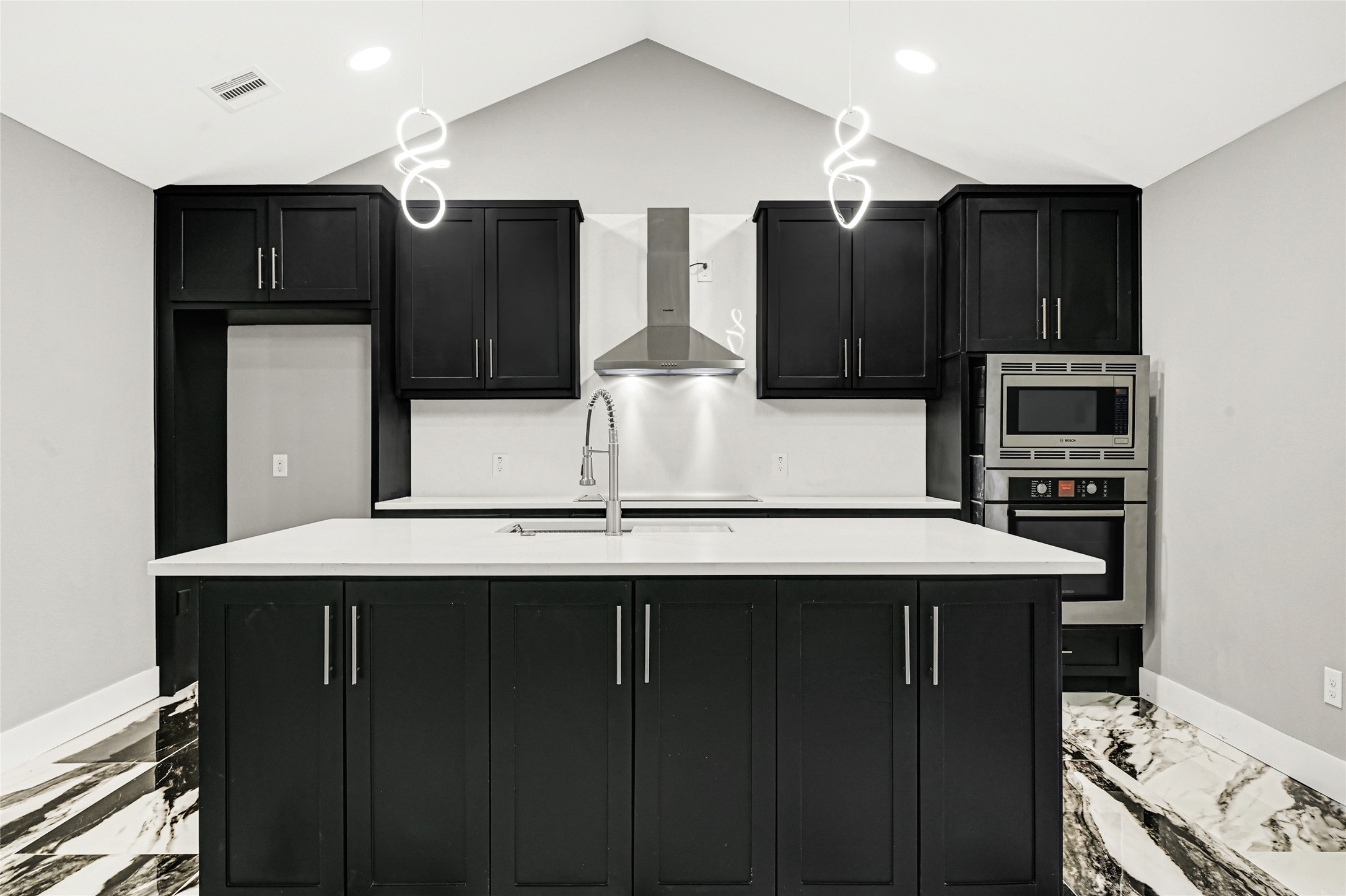 3822 Darling Avenue Pasadena, TX 77503 - Photo 3 of 19 a kitchen with stainless steel appliances a sink and cabinets
