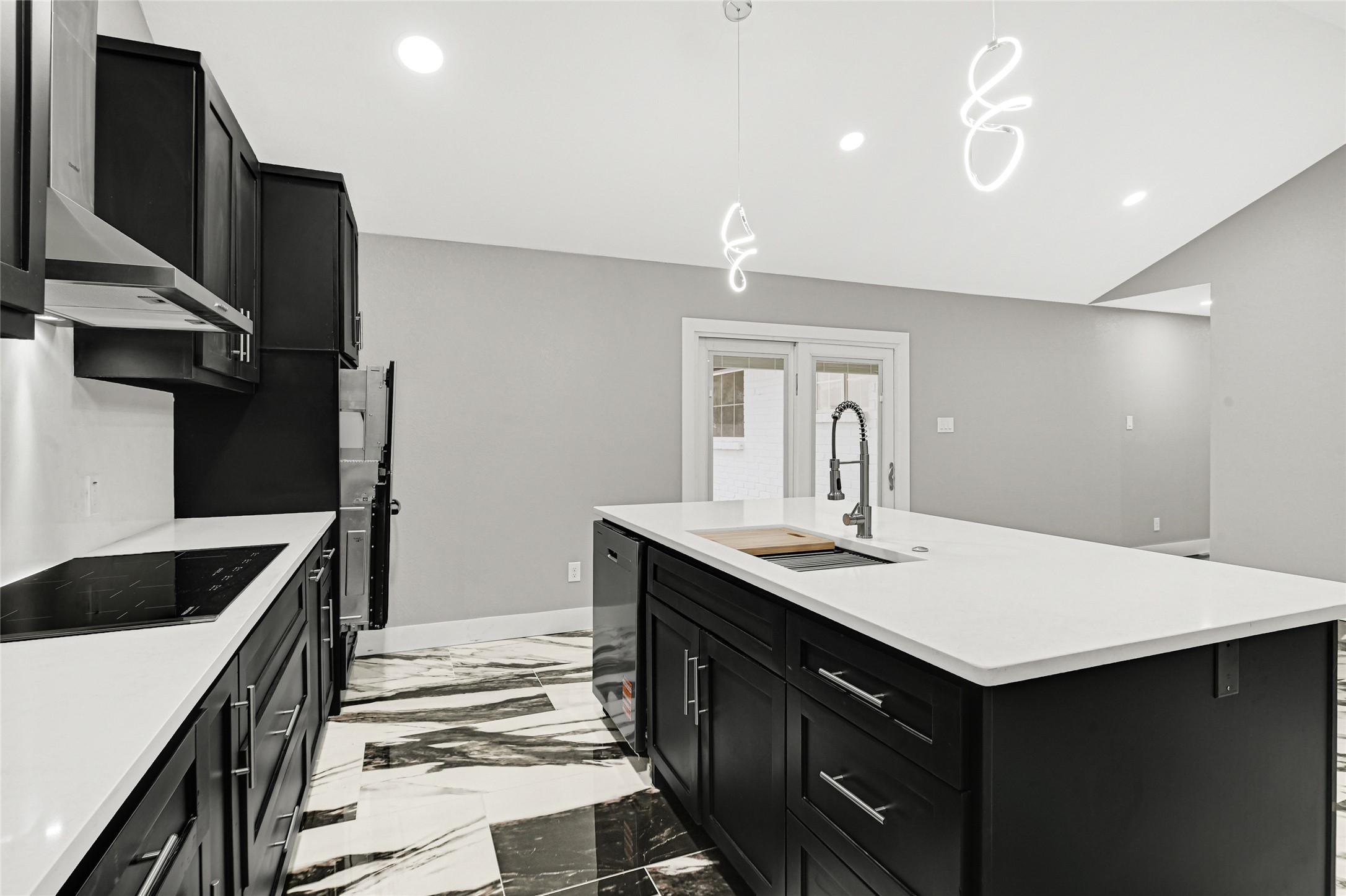 3822 Darling Avenue Pasadena, TX 77503 - Photo 6 of 19 a kitchen with a sink dishwasher a stove and a refrigerator with wooden floor