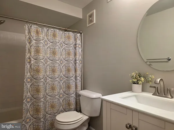a bathroom with a sink and a toilet