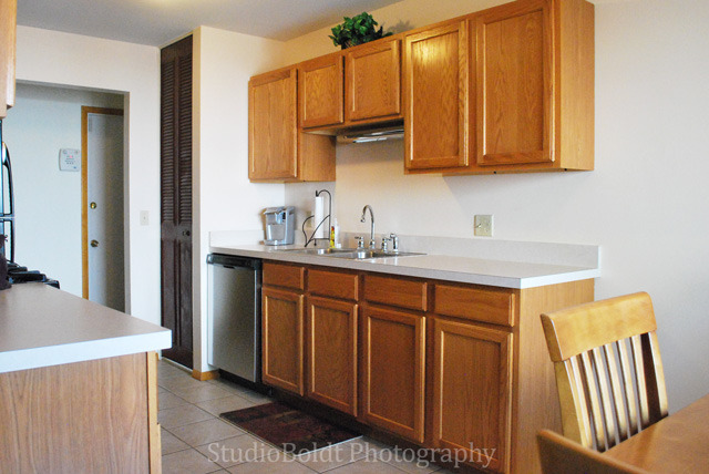 89 Fernwood Road Montgomery, IL 60538 - Photo 6 of 18 a kitchen with stainless steel appliances granite countertop a sink stove and cabinets