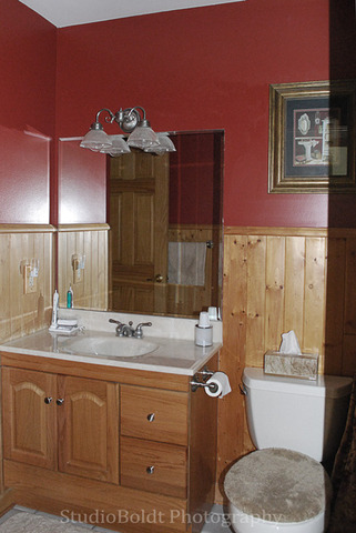 89 Fernwood Road Montgomery, IL 60538 - Photo 9 of 18 a bathroom with a granite countertop sink a toilet a mirror and bathtub