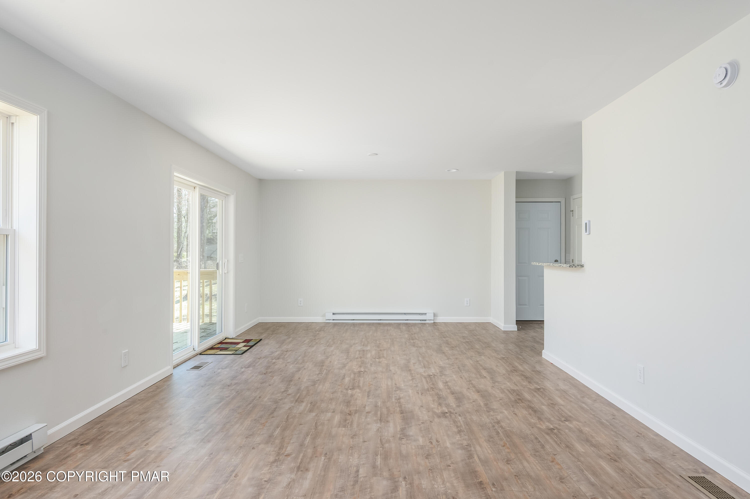 456 Big Oak Road Canadensis, PA 18325 - Photo 11 of 20 an empty room with windows