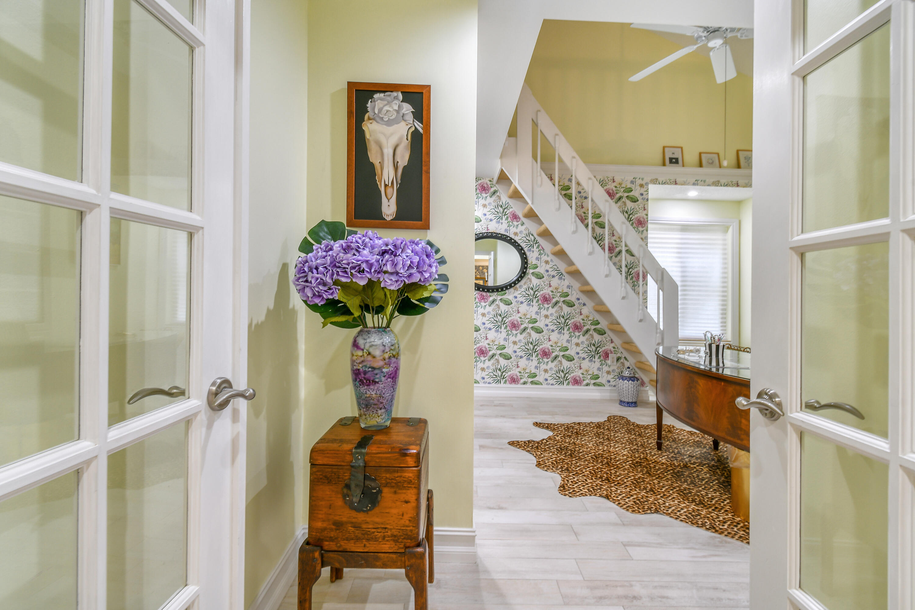 127 Dunes Edge Road Jupiter, FL 33477 - Photo 39 of 58 a view of entryway and hall with wooden floor