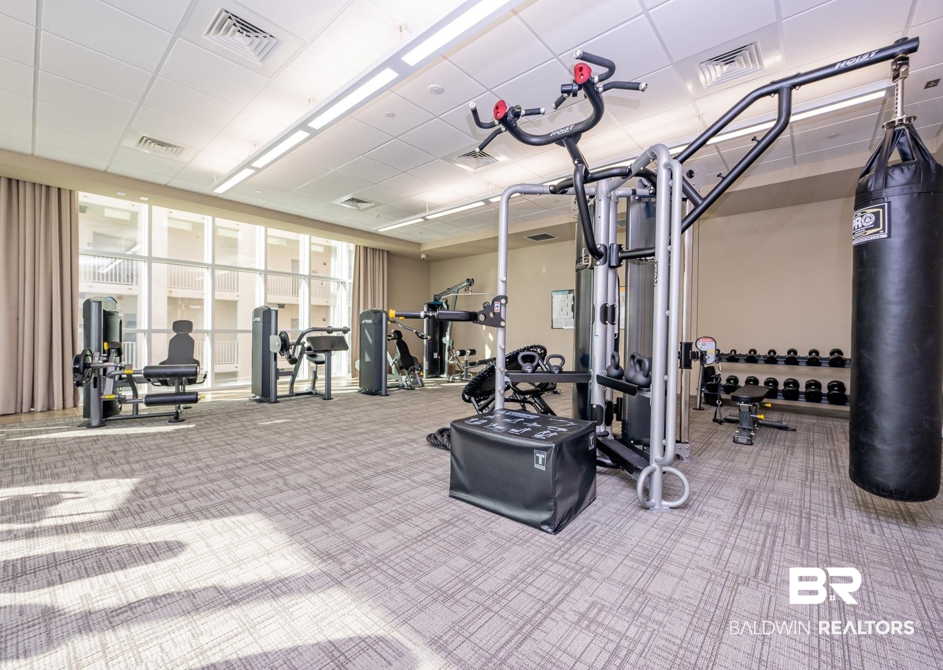 23008 Perdido Beach Boulevard, Unit 506 Orange Beach, AL 36561 - Photo 42 of 48 Gym with visible vents and carpet floors
