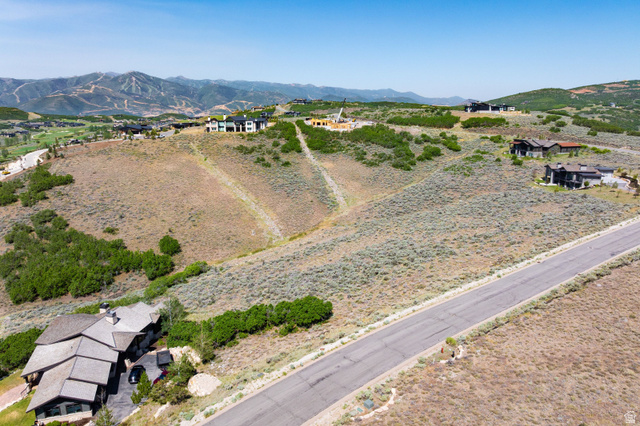 3508 Ridgeway Drive, Unit 31 Heber City, UT 84036 - Photo 10 of 13 Expansive undeveloped land parcel featuring natural vegetation and a distant mountain backdrop