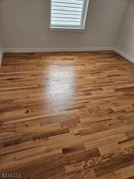 685 Bergen Street Newark, NJ 07108 - Photo 10 of 12 a view of room and wooden floor