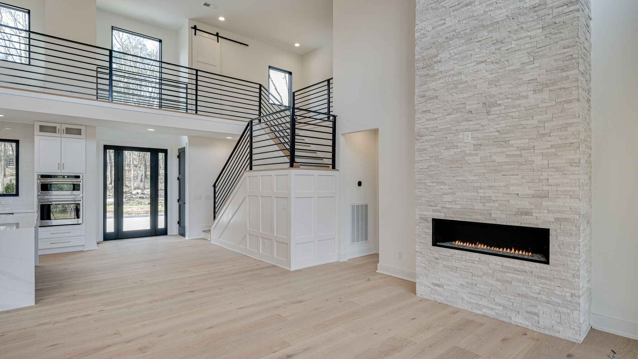 8564 Taliaferro Road Eagleville, TN 37060 - Photo 13 of 49 an entryway in a hall with a fireplace