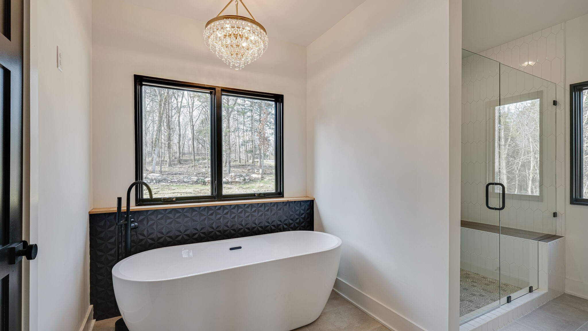 8564 Taliaferro Road Eagleville, TN 37060 - Photo 16 of 49 a bathroom with a bathtub and a shower