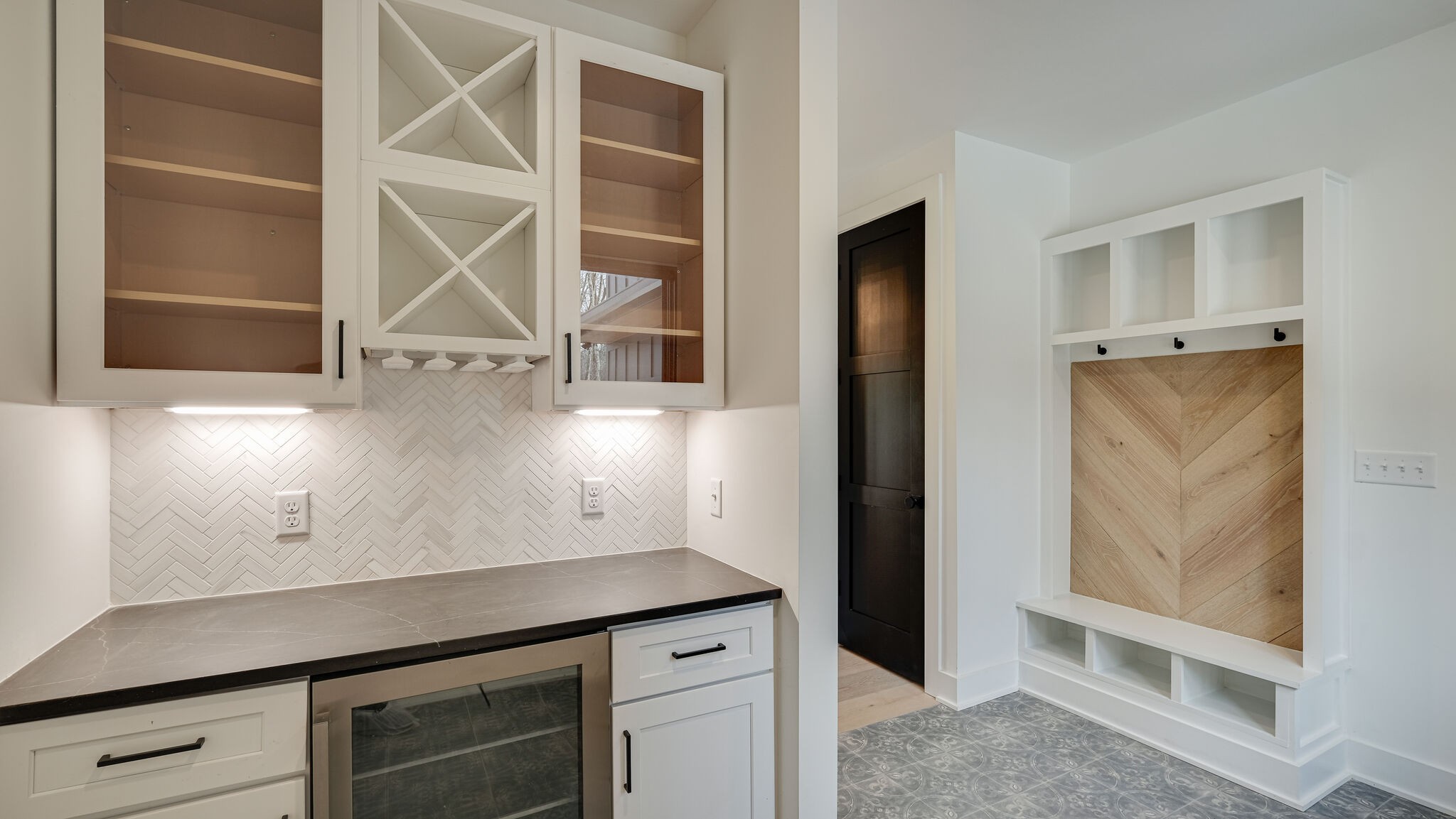 8564 Taliaferro Road Eagleville, TN 37060 - Photo 20 of 49 a view of a kitchen with wooden floor and a window