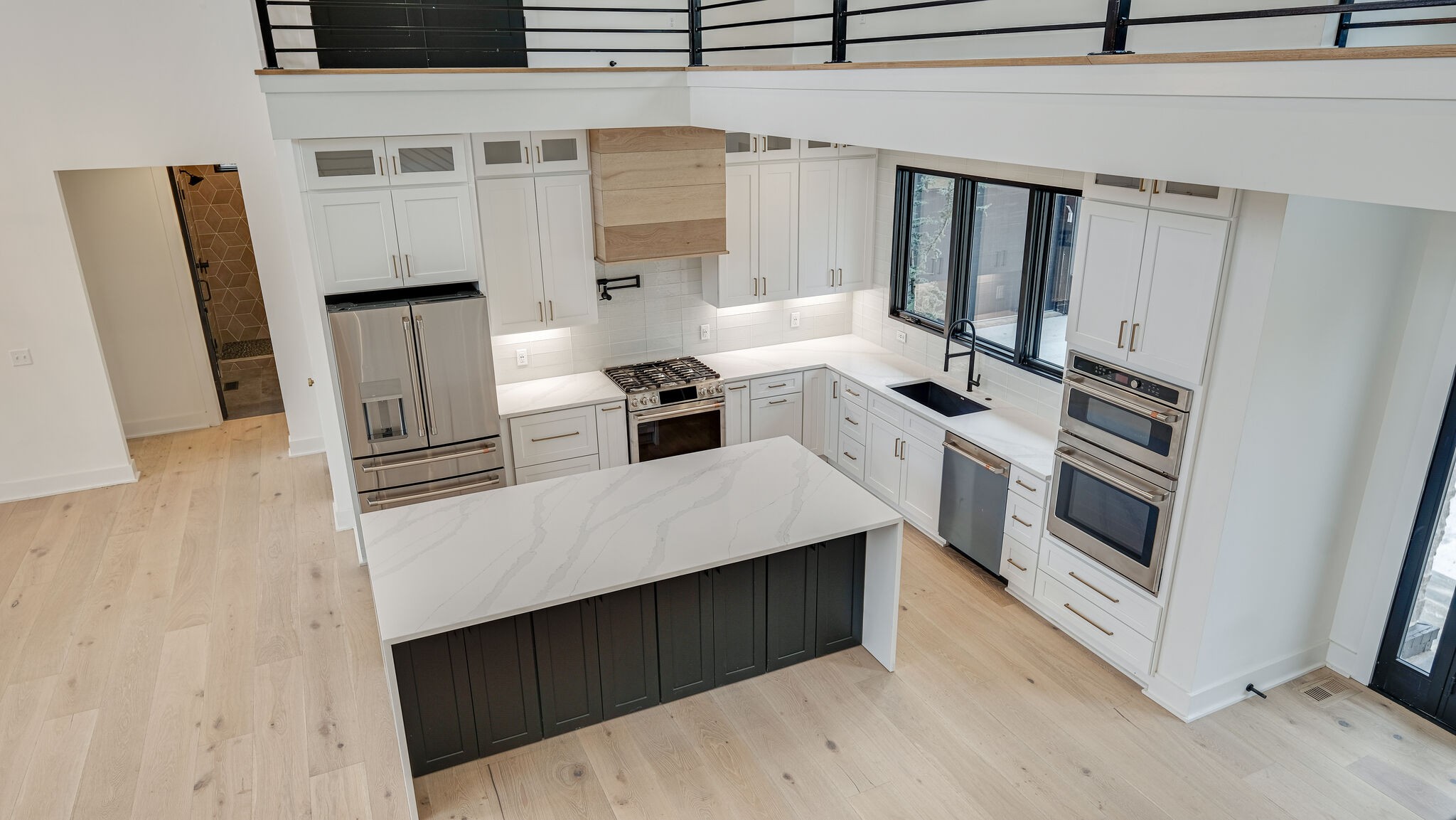 8564 Taliaferro Road Eagleville, TN 37060 - Photo 25 of 49 a kitchen with stainless steel appliances a stove microwave and a refrigerator