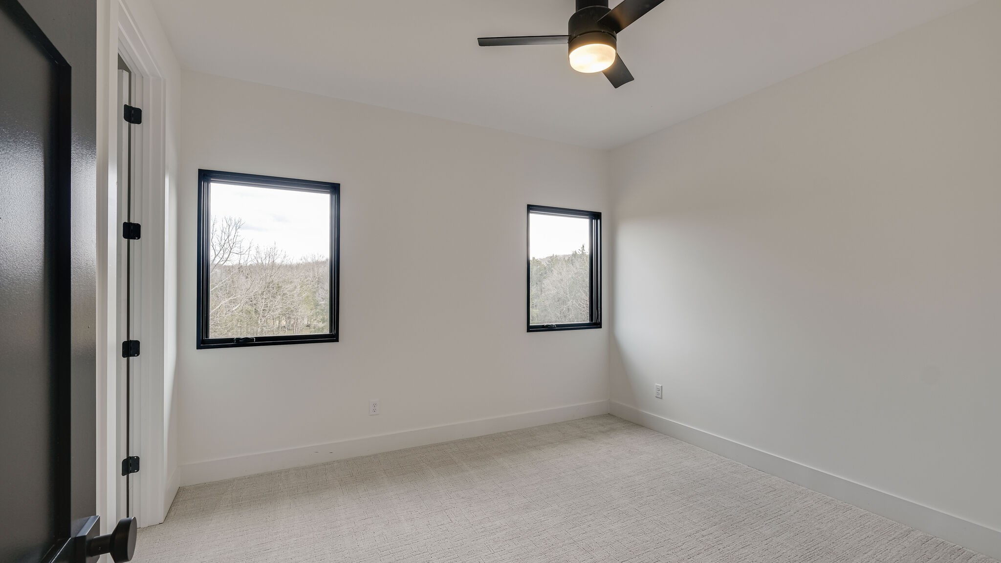 8564 Taliaferro Road Eagleville, TN 37060 - Photo 38 of 49 an empty room with windows