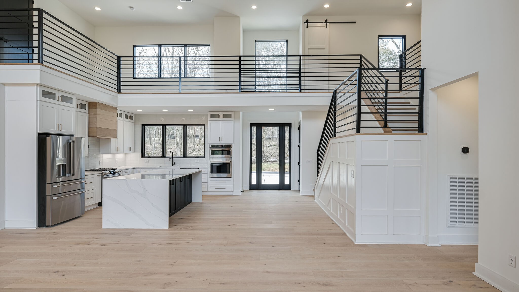 8564 Taliaferro Road Eagleville, TN 37060 - Photo 7 of 49 a kitchen with refrigerator and cabinets