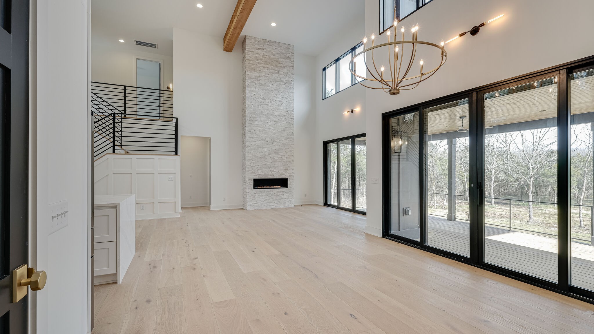 8564 Taliaferro Road Eagleville, TN 37060 - Photo 8 of 49 a view of empty room with wooden floor and fan