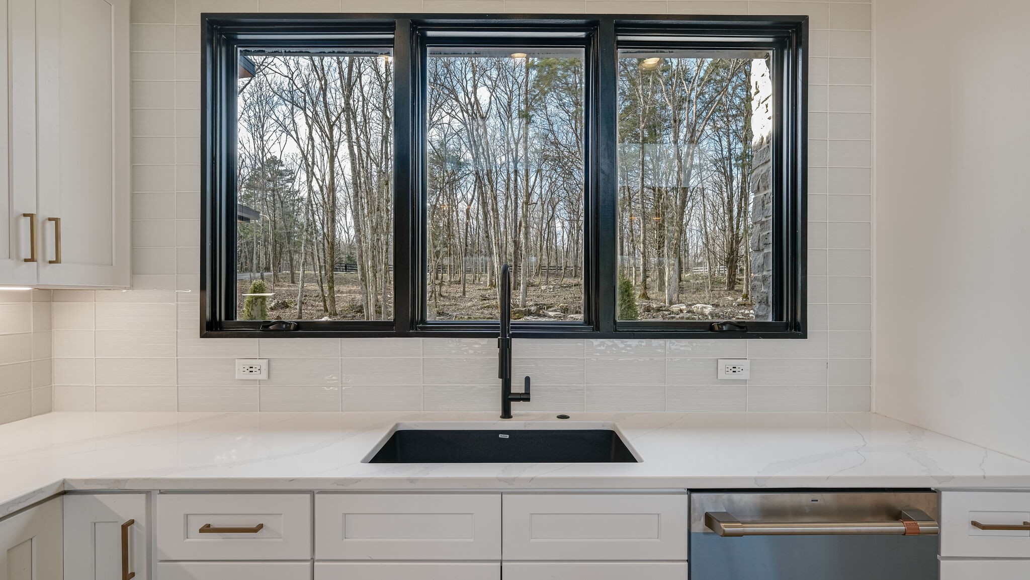 8564 Taliaferro Road Eagleville, TN 37060 - Photo 9 of 49 a sink with a close up of cabinets and a window
