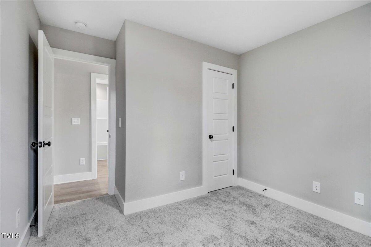 145 East Jay Street Coats, NC 27521 - Photo 11 of 15 a view of an empty room