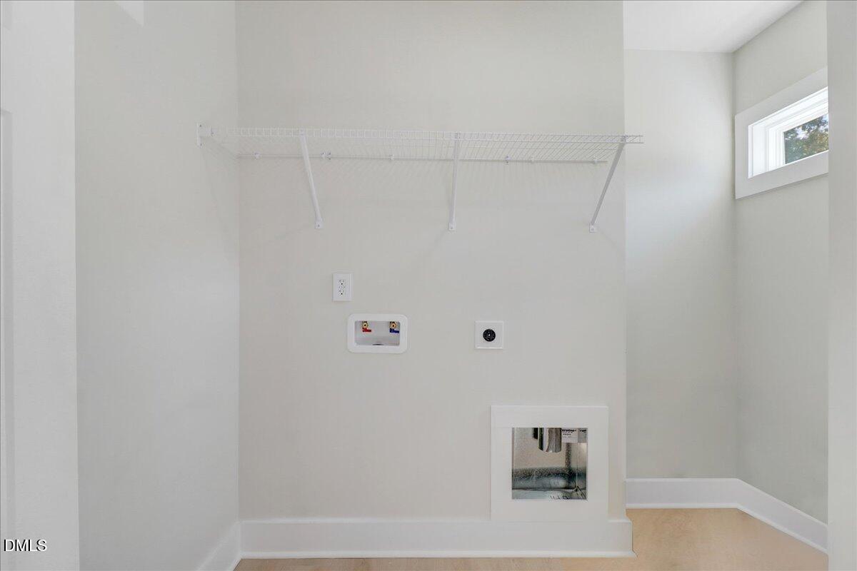 145 East Jay Street Coats, NC 27521 - Photo 14 of 15 a bathroom with a bathtub