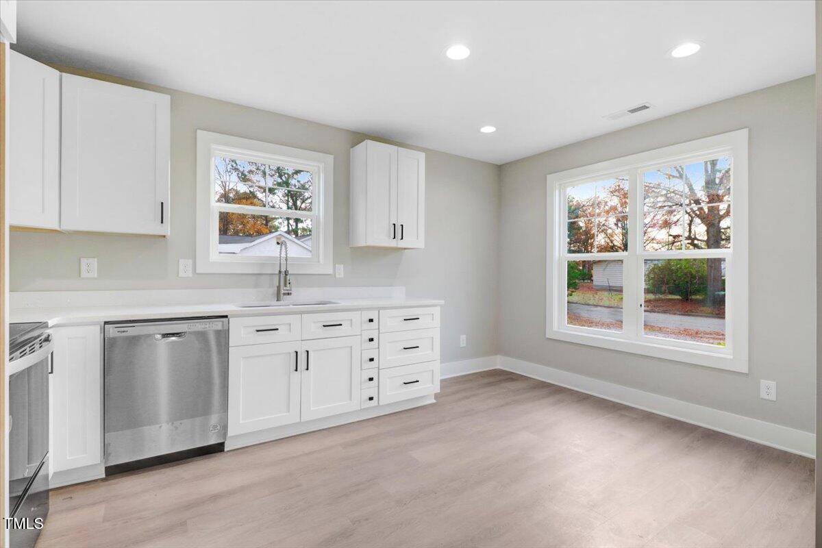 145 East Jay Street Coats, NC 27521 - Photo 5 of 15 a room with window and sink