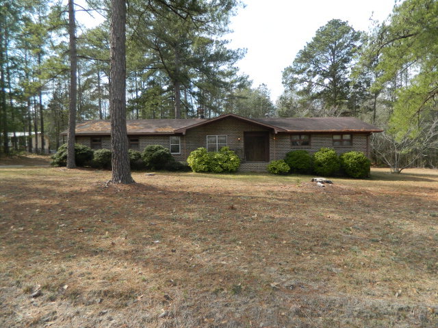 4175 Fulton Mill Road Macon, GA 31216 - Photo 1 of 1 a view of a house with a yard