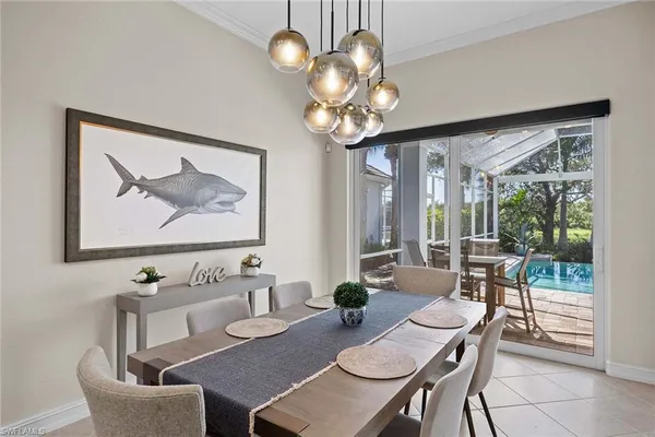 a view of a dining room with furniture window and outside view