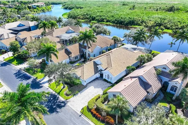 an aerial view of a house with a garden
