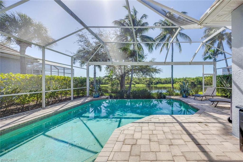 8446 Mallards Way Naples, FL 34114 - Photo 28 of 50 a view of a backyard with a patio