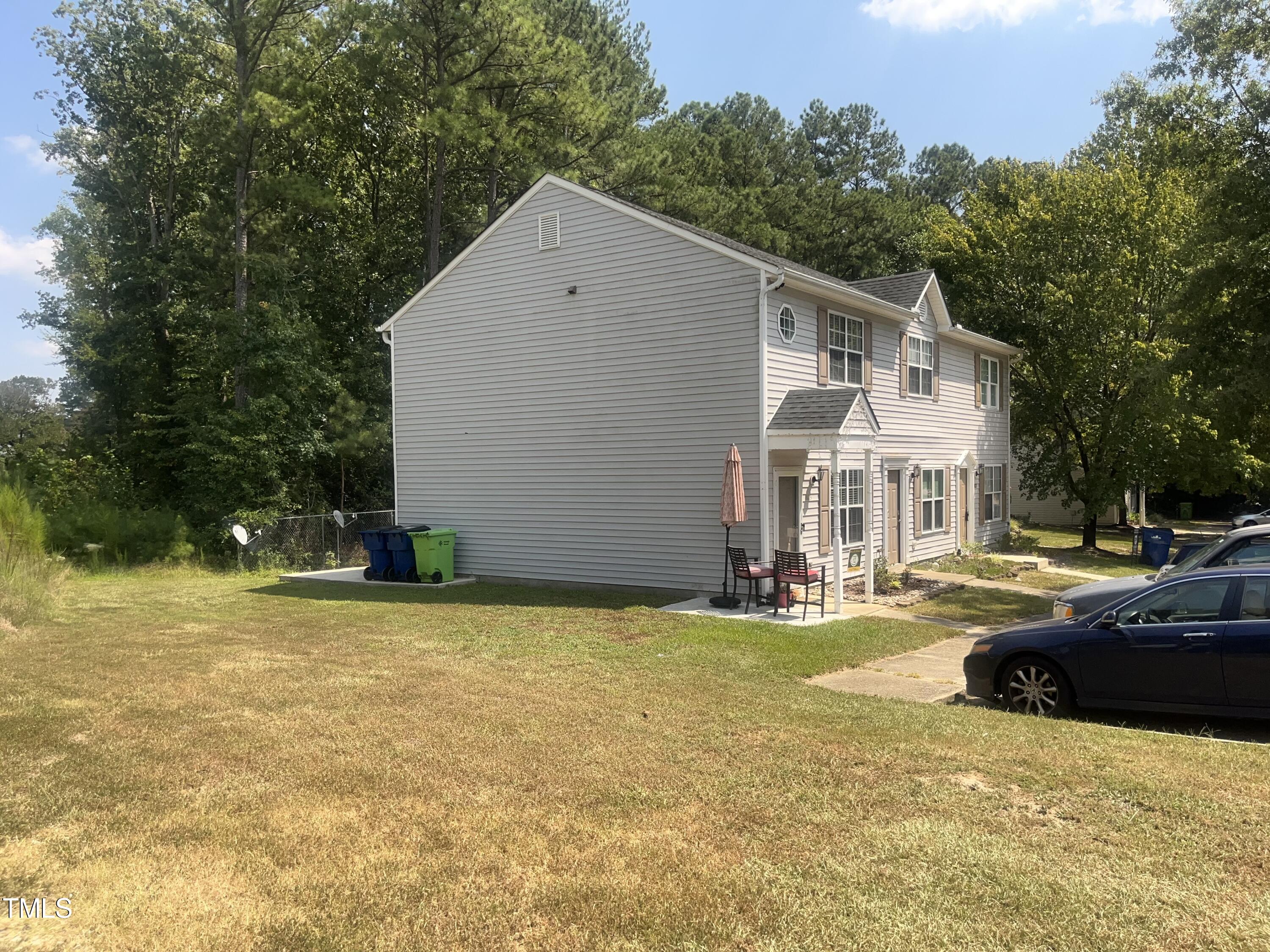 1823 Vintage Road Raleigh, NC 27610 - Photo 13 of 14 a view of a house with swimming pool and sitting area