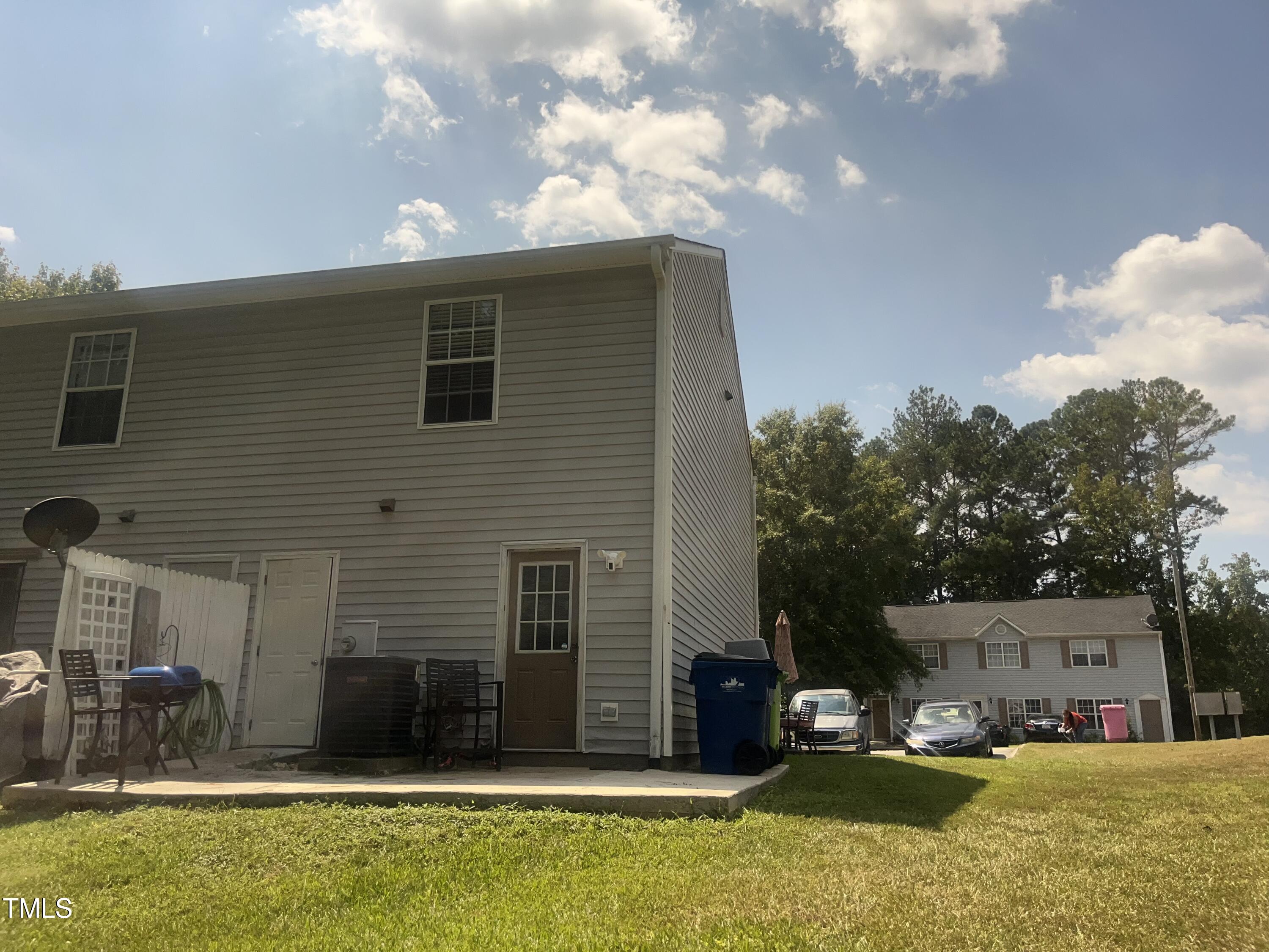 1823 Vintage Road Raleigh, NC 27610 - Photo 14 of 14 a view of a house with a yard