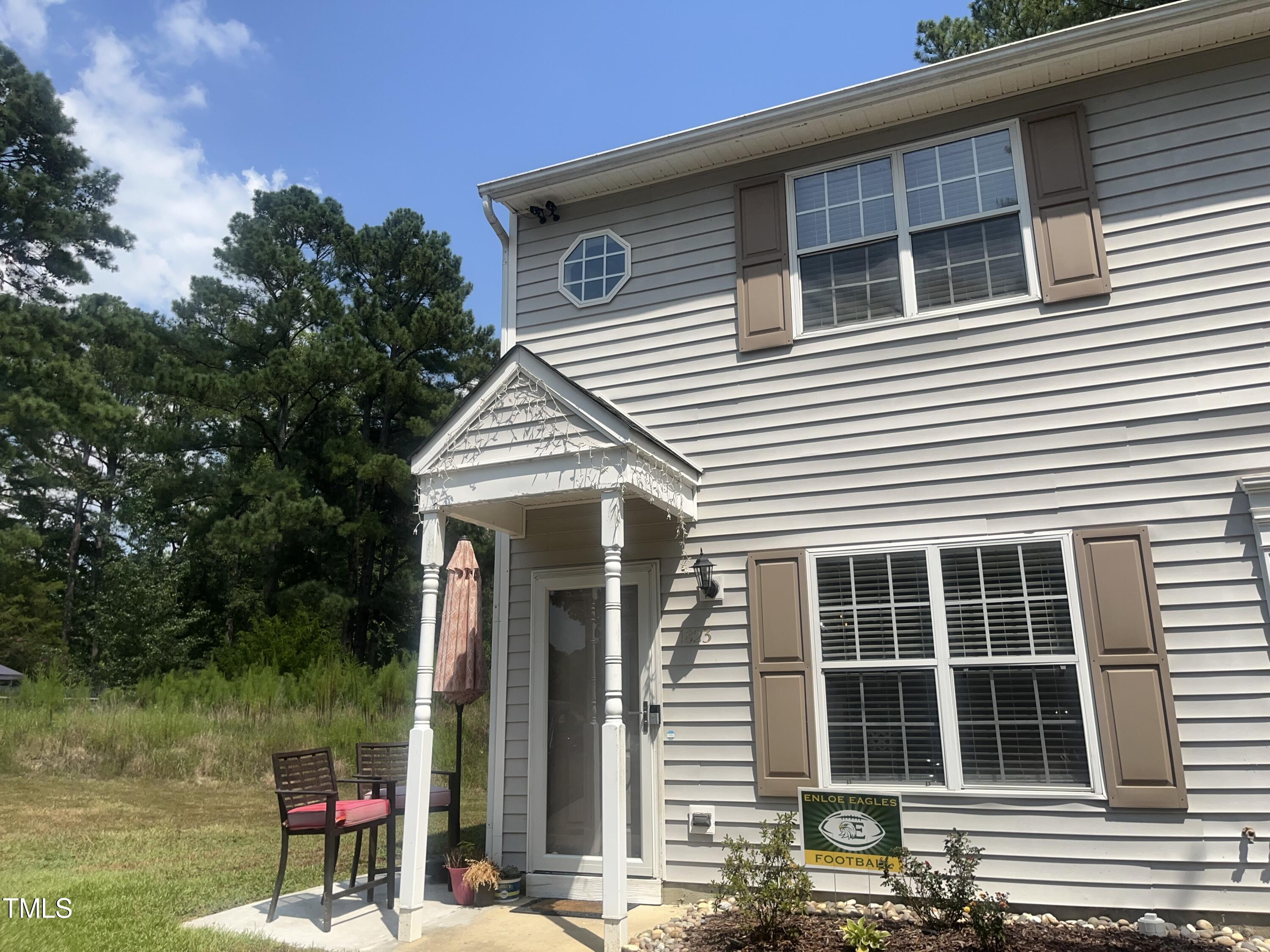 1823 Vintage Road Raleigh, NC 27610 - Photo 6 of 14 a front view of a house with a yard