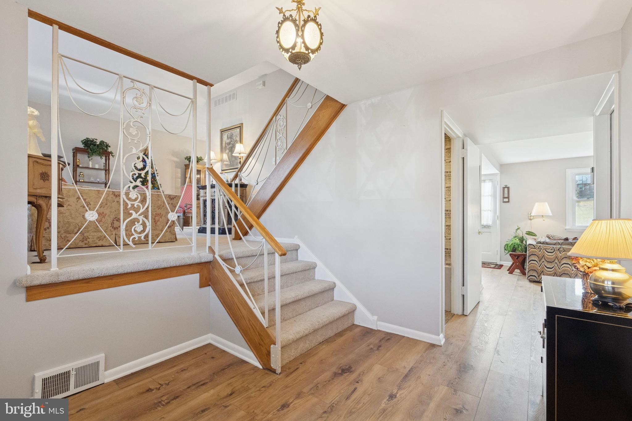 72e East Heron Road Southampton, PA 18966 - Photo 3 of 25 Entry Foyer to Living Rm Classic Wrought Iron