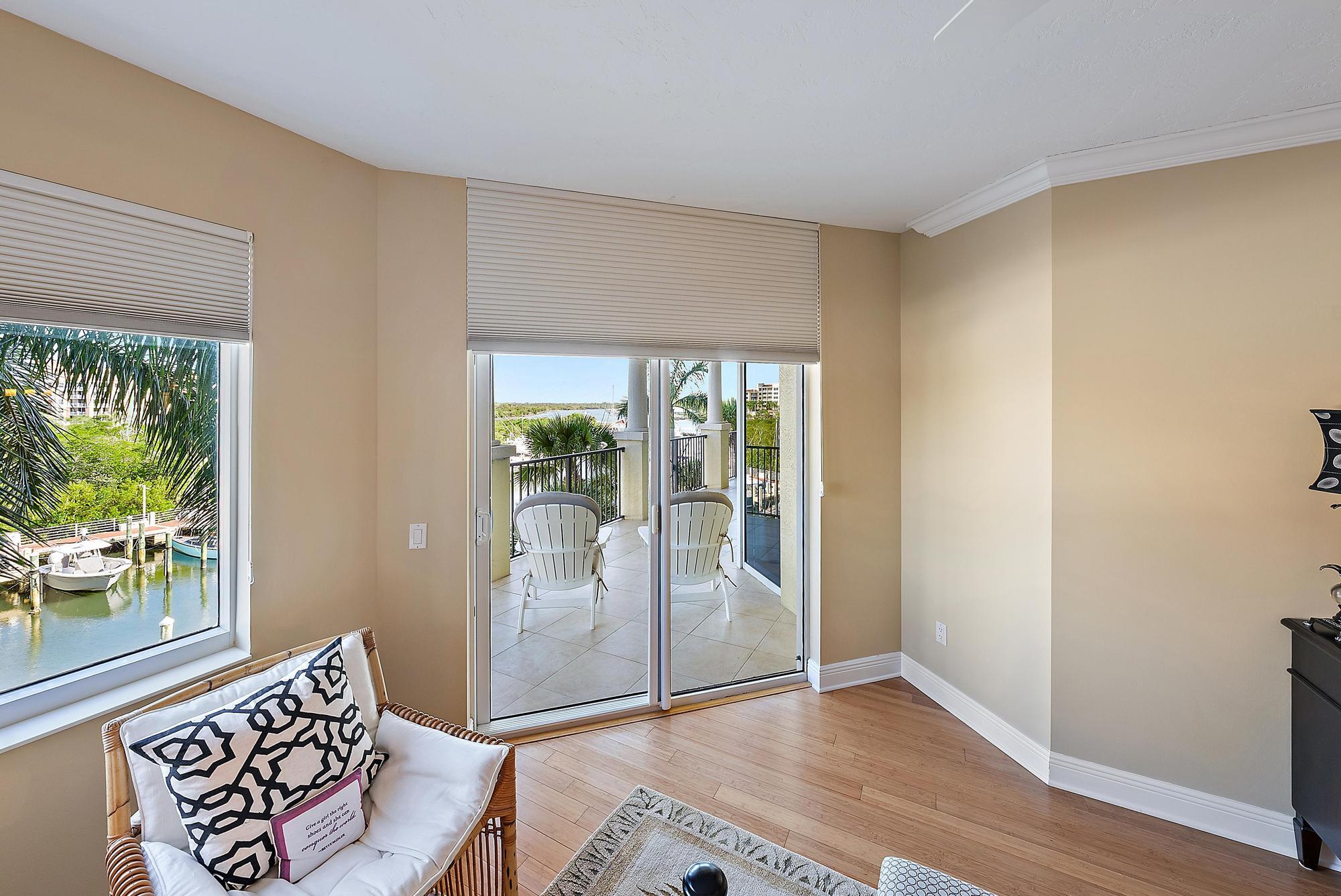 340 Highway 1, Unit 305 Jupiter, FL 33477 - Photo 13 of 26 a living room with furniture and a window