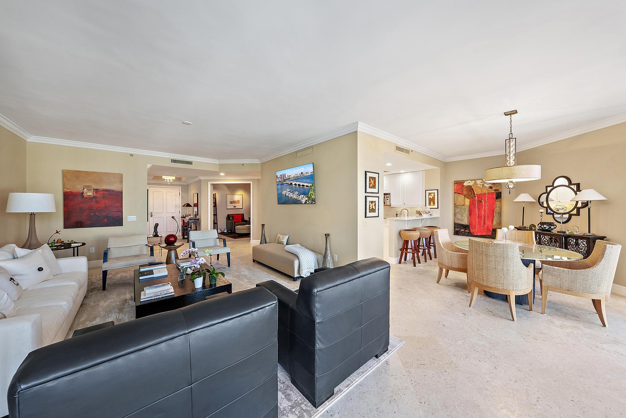 340 Highway 1, Unit 305 Jupiter, FL 33477 - Photo 6 of 26 a living room with furniture and a wooden floor