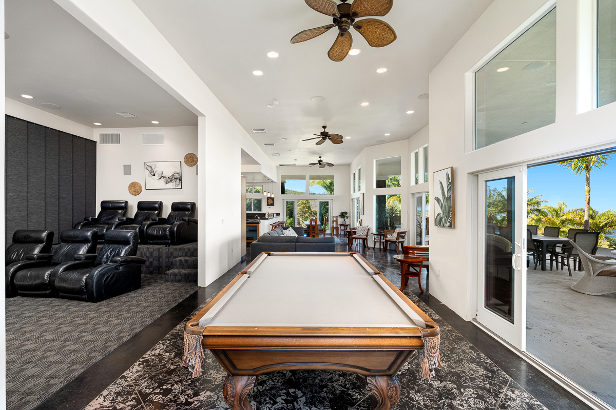 34-144 Kaihuiki Road Ninole, HI 96773 - Photo 12 of 25 a room with gym equipment and a rug