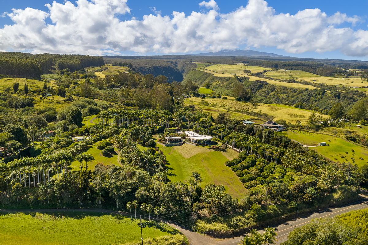 34-144 Kaihuiki Road Ninole, HI 96773 - Photo 24 of 25 a view of a lake with a building in the background