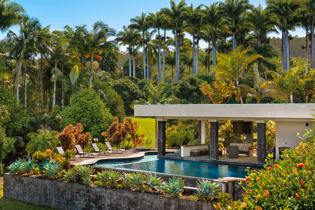 34-144 Kaihuiki Road Ninole, HI 96773 - Photo 5 of 25 a view of swimming pool with outdoor seating and plants