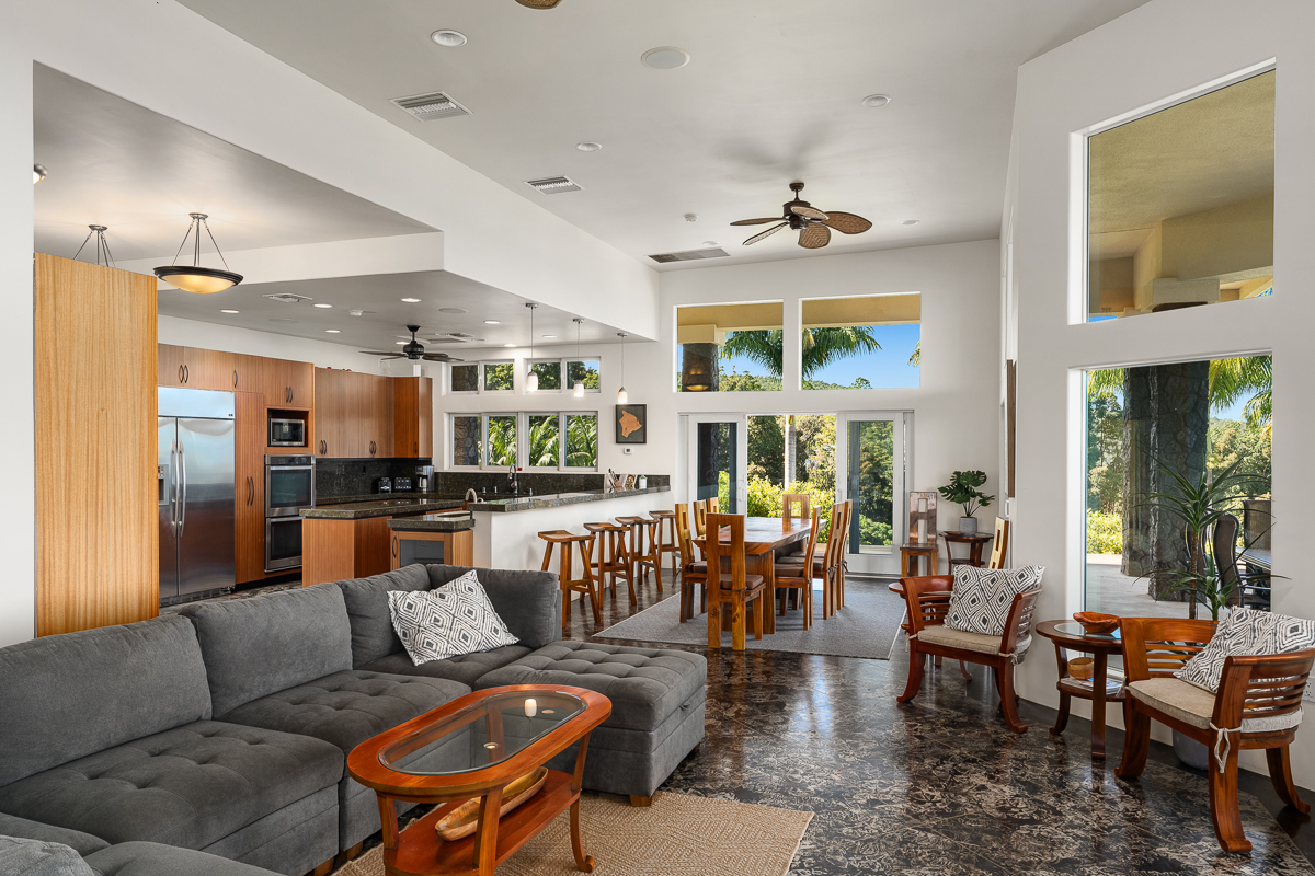34-144 Kaihuiki Road Ninole, HI 96773 - Photo 10 of 25 a living room with furniture kitchen view and a large window