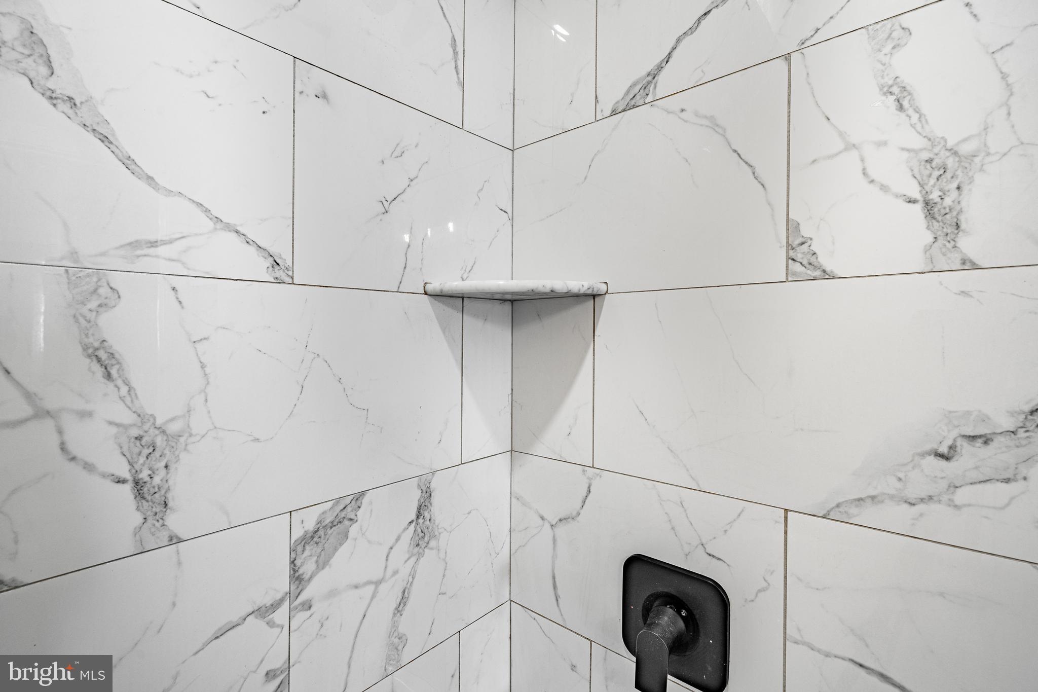 530 Washington Avenue, Unit 4 Phoenixville, PA 19460 - Photo 13 of 28 a bathroom with a sink and a shower