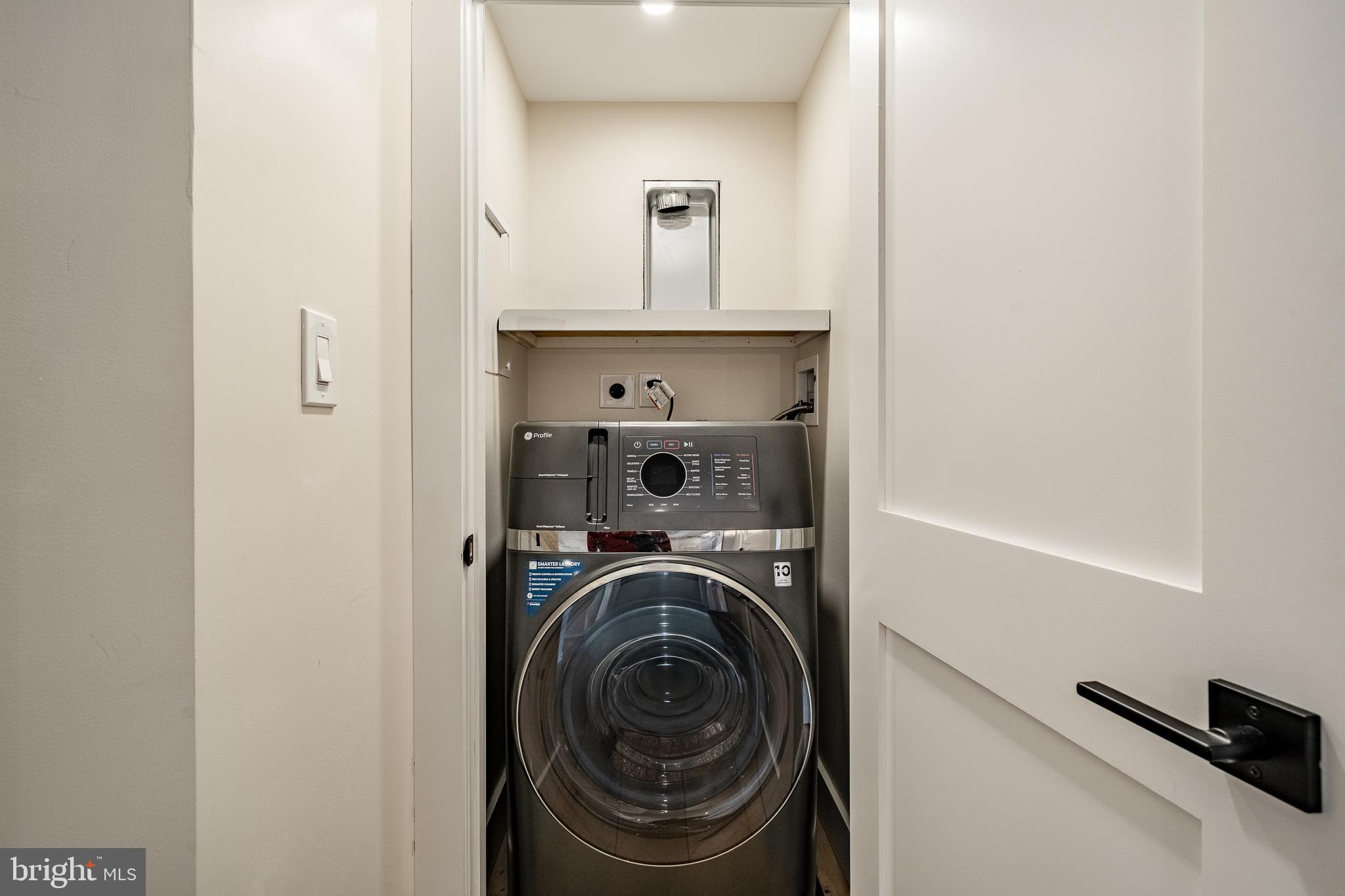 530 Washington Avenue, Unit 4 Phoenixville, PA 19460 - Photo 17 of 28 a view of a hallway with washer and dryer