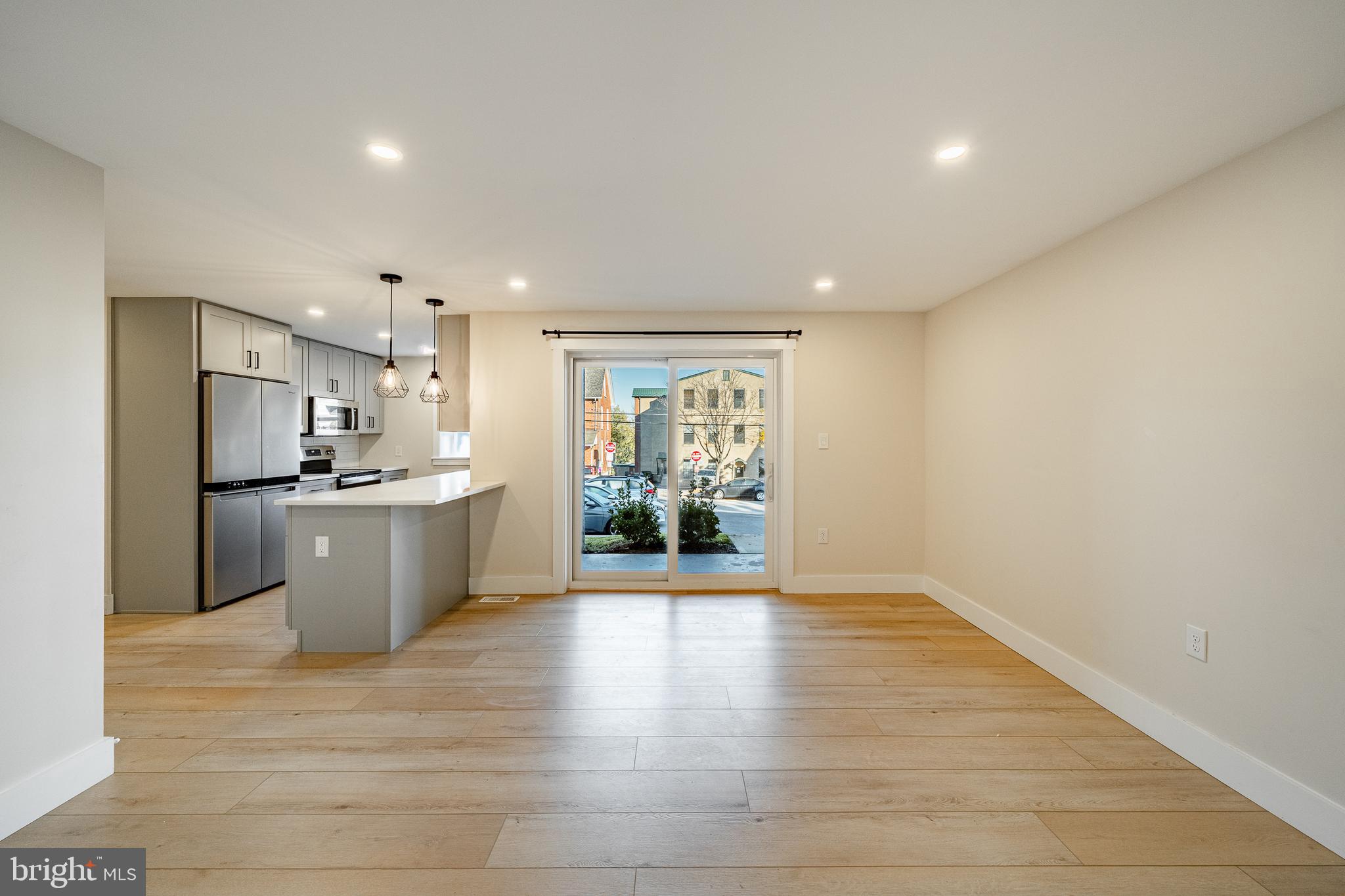 530 Washington Avenue, Unit 4 Phoenixville, PA 19460 - Photo 3 of 28 a view of kitchen with refrigerator and window